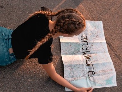 Girl reading a map